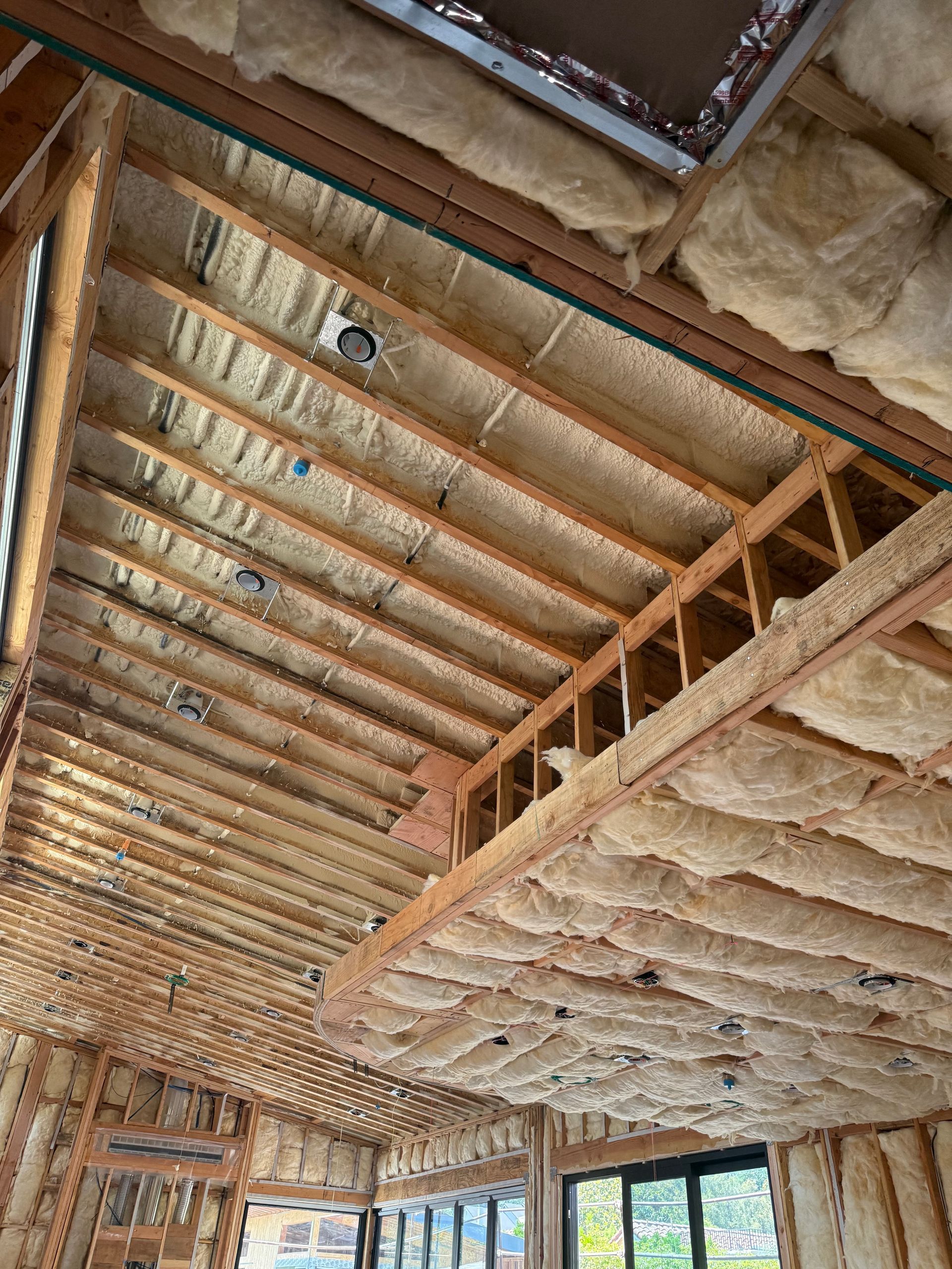 Spray foam insulation at the roof deck of a Tarzana attic